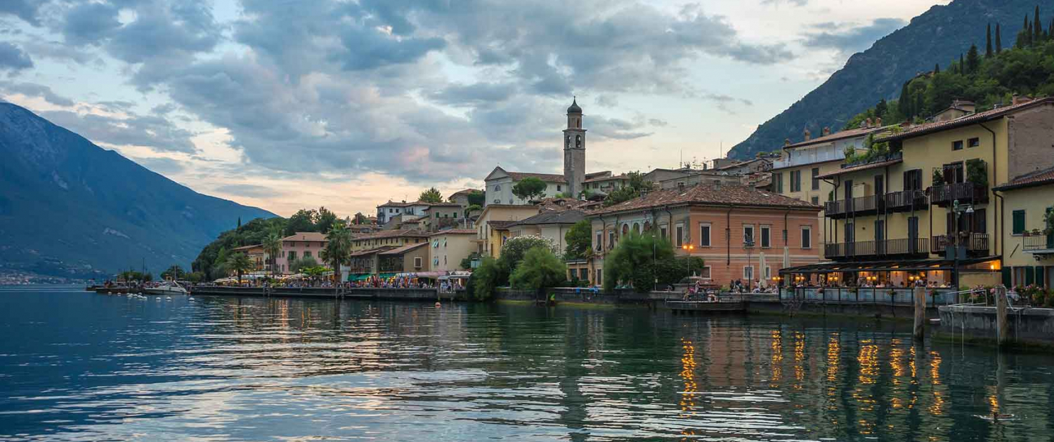A beautifu Itallian Riviera scene with a large lake surrounded by houses
