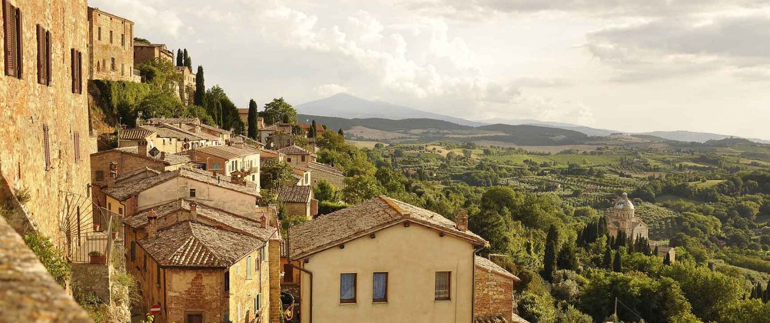 A rustic Italian village with hilltop houses